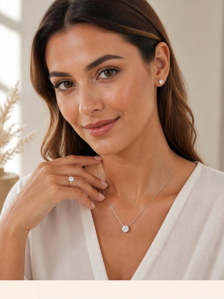 Woman wearing Celestial Grace Six-Prong Stud Earrings, front view