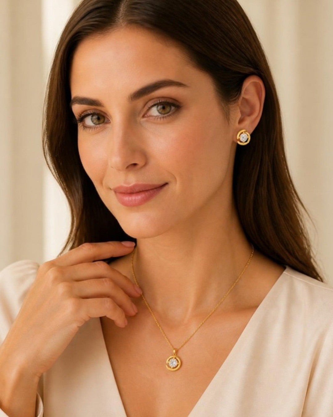 Woman wearing Aurora Gold Embrace Stud Earrings, front view
