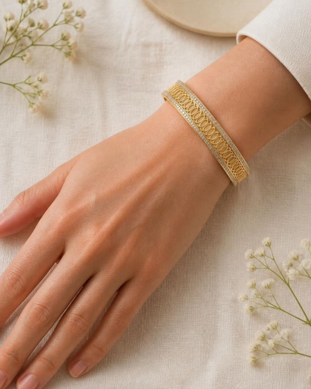 Woman wearing Celestial Harmony Diamond Bangle, top-down view