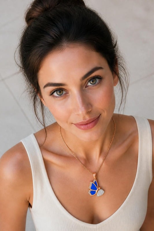 Butterfly Royal Radiance Pendant worn by a model, top-down view