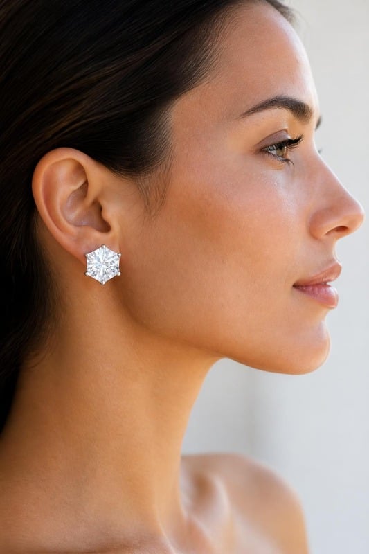 Celestial Crown Hexa Solitaire Stud Earrings worn by a model, side view