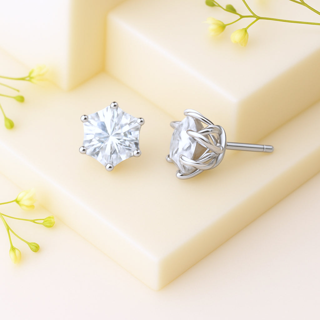 Celestial Crown Hexa Solitaire Stud Earrings featuring a round-cut stone in a woven six-prong crown