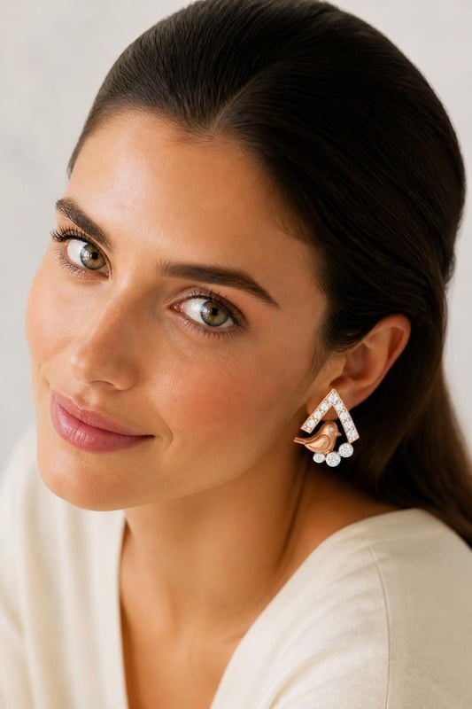 Chirp Delight Diamond Earrings worn by a model, top-down view