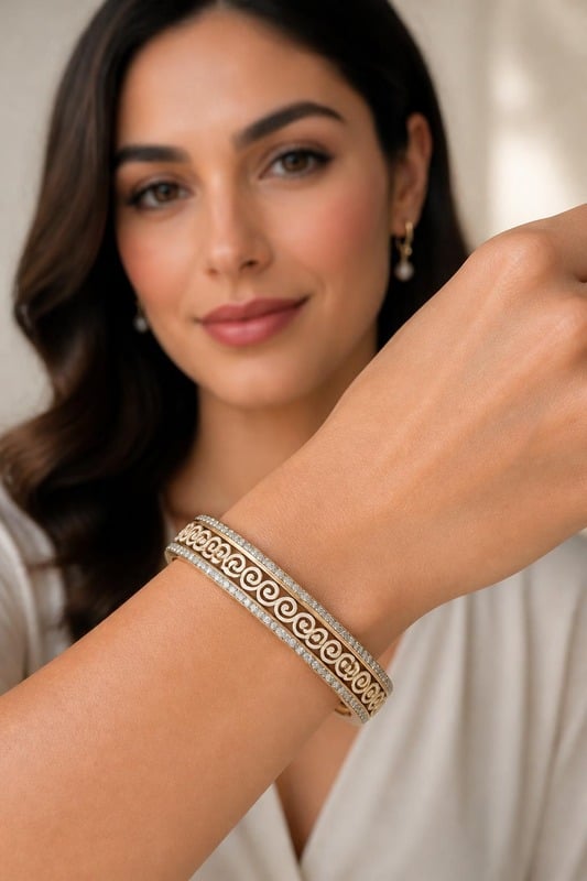 Elysian Swirl Diamond Bangle worn by a model, front view