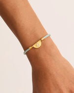 Load image into Gallery viewer, Lotus Blue Cord Bracelet
